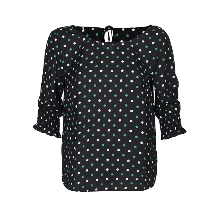 green and white polka dot shirt